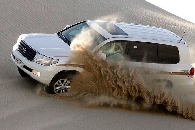 4hr Desert Safari: Sunset,Sunrise,Camel,Sand boarding,Inland Sea - Authentic Experiences and Practical Tips