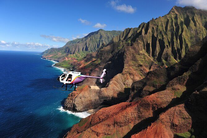 60-Minute Guided Doors-Off Helicopter Tour in Kauai - The Route: From Coastal Beauty to Rugged Canyons