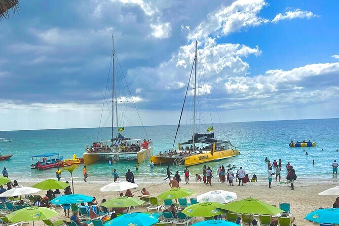 7 Mile Beach Party Catamaran Cruise with Snorkeling & Ricks Cafe - An In-Depth Look at the Tour Experience