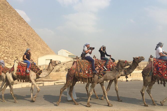 a camel ride in Sunset, with dinner Sound&Light Show at Giza Pyramids - Transfer and Comfort