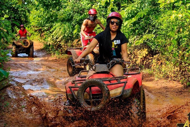 Adrenaline day driving ATVs doing Ziplines and swimming in a Cenote from Cancun - A Practical Look at the Adventure