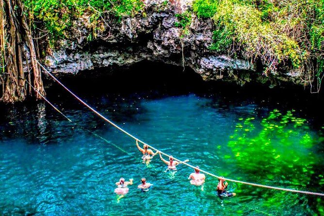 Adrenaline day driving ATVs doing Ziplines and swimming in a Cenote from Cancun - The Sum Up