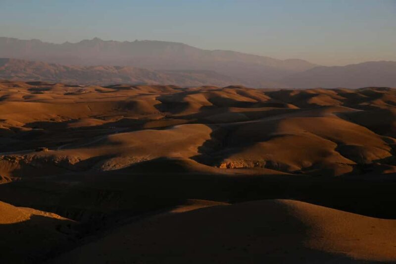 Agafay Tour: Sunset, Dinner, Camel ride, Quad and fire show - The Sum Up