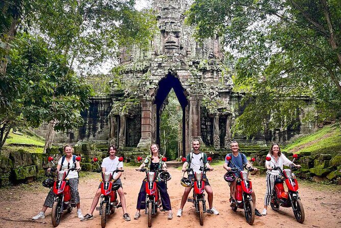 Angkor Wat Sunrise Tour By E-Bike Experience With Breakfast Included - Angkor Thom and the Bayon Temple