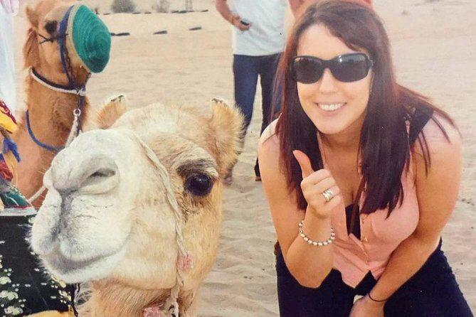 Arabian Desert Safari with BBQ Dinner Camel Ride, Sand Boarding - Authenticity and Value
