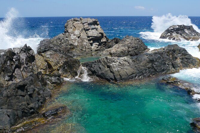 Arikok Sunrise Hiking Tour to Natural Pool + Transportation - Key Points