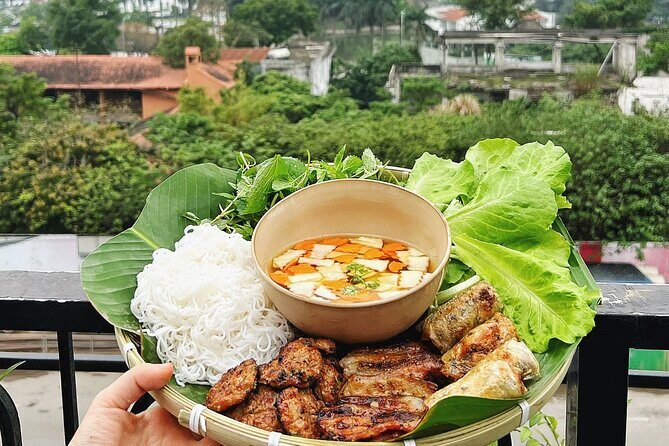 Authentic Bun Cha Hanoi making - with skyline view of Westlake - What Makes This Tour Stand Out