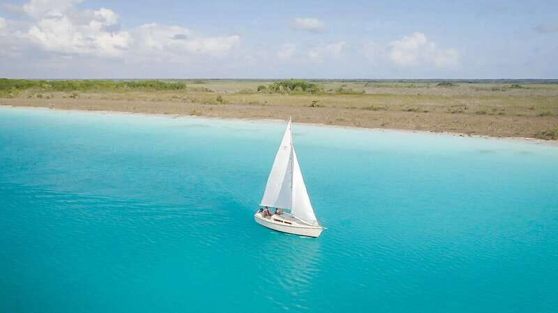 Bacalar: Group Sailing Trip with Swimming and Drinks - Introduction to the Experience