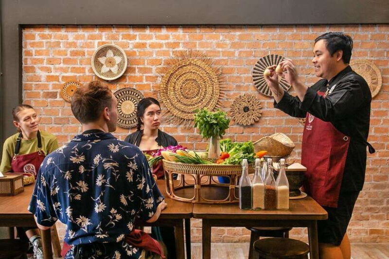 Bangkok: Cooking Class with Market Visit & Tuk Tuk Ride - Cooking in a Modern Kitchen