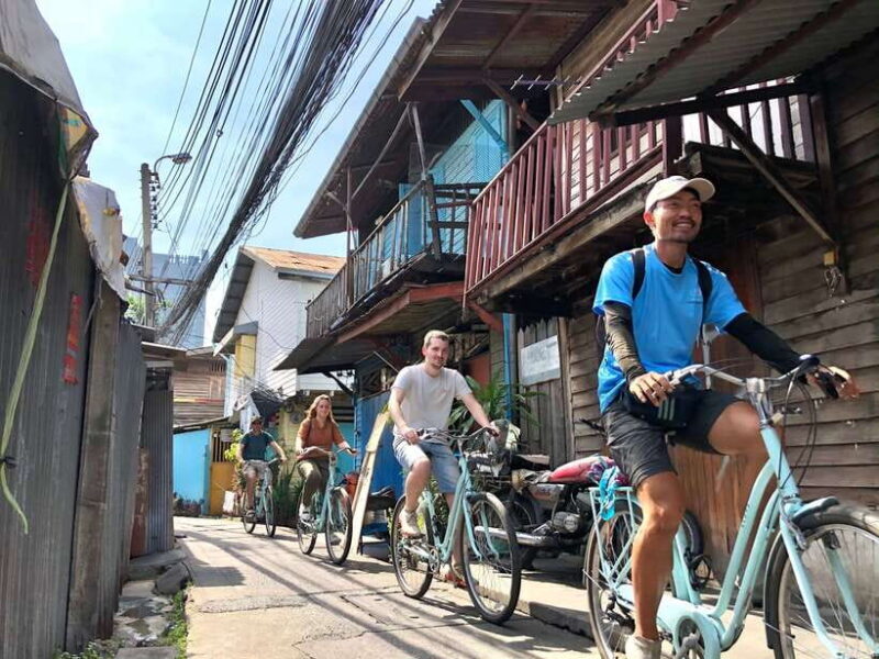 Bangkok: Temples, Canals & Local Life Bike Tour - Navigating Canals and Waterways
