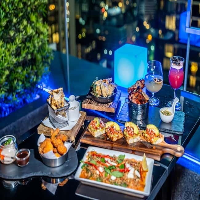 Bangkok: The Vue Bar Rooftop at Mercure Bangkok Sukhumvit 24 - To sum it up, The Vue Bar Rooftop at Mercure Bangkok Sukhumvit 24 offers a balanced mix of spectacular views, delicious food, and affordable pricing. It’s a solid choice for those seeking a relaxed, authentic rooftop experience with a friendly vibe. Whether you’re in town for a quick drink after sightseeing or want a cozy spot to watch the sunset, this bar provides a genuine taste of Bangkok’s skyline without the pretension or hefty price tag. Perfect for travelers who value casual comfort, great service, and memorable vistas—it’s a place where you can truly enjoy Bangkok from above.