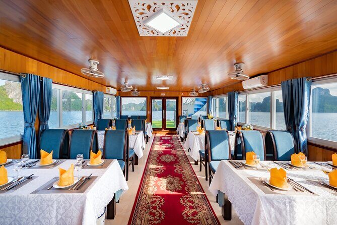 Best seller Halong Bay Day cruise: Sung Sot cave, Titop, kayaking - Titop Island: Beach, Hiking, and Panoramic Views