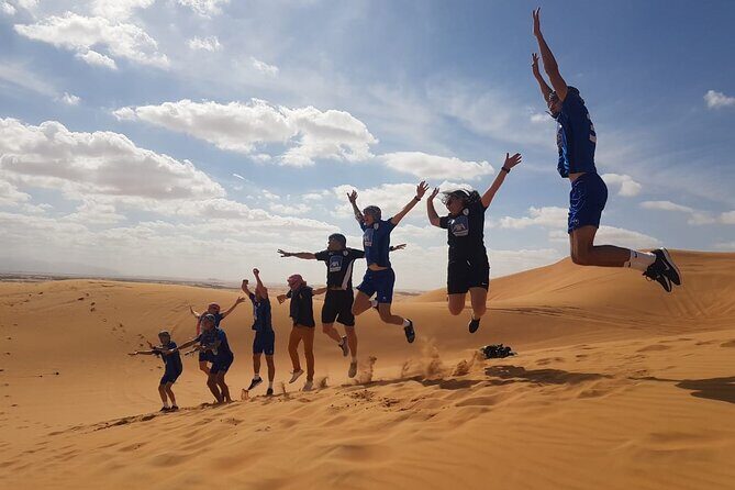 Big Red Dunes Desert Safari in Dubai with Camel Ride, Live Shows & BBQ Dinner - The Sum Up