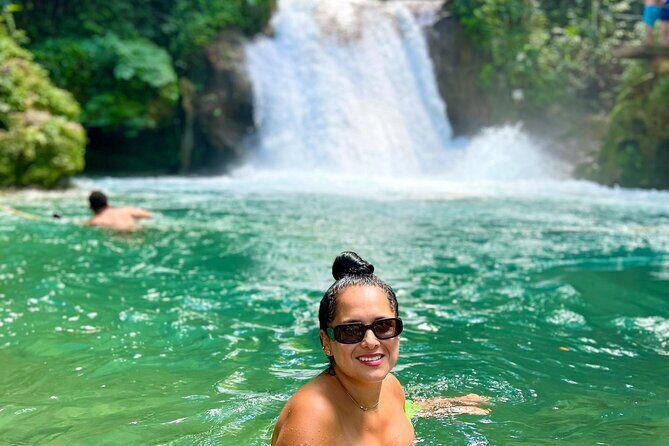 Blue Hole Waterfalls and Bamboo Rafting with Transportation - The Experience: What to Expect