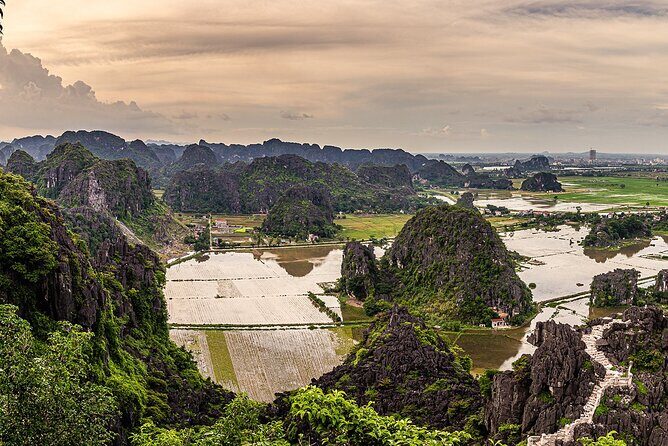 Boat and Bike Riding with Mua Cave in Ninh Binh Full Day Tour - Cycling & Mua Cave: A Climb for the Views