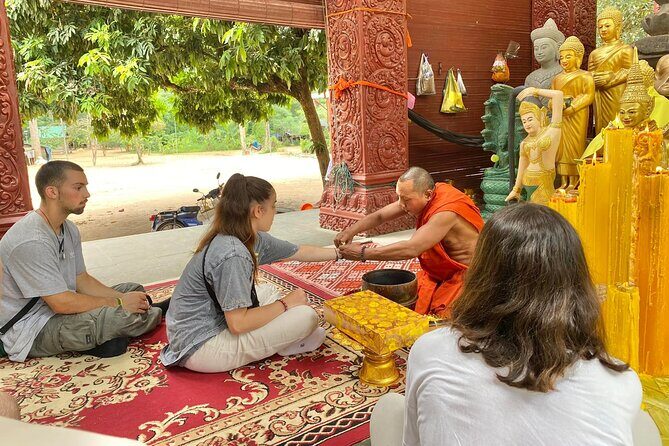 Buddhist Monastery with Monks Water Blessing - Key Points