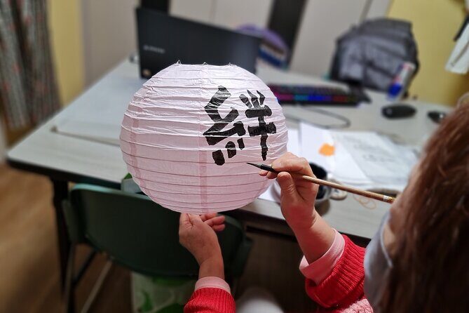 Calligraphy on T-shirt and lantern near Skytree Tokyo - The Sum Up