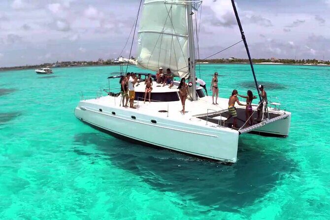 Cancun All Inclusive Catamaran Tour to Isla Mujeres - Starting the Day: Meeting Point and Transportation