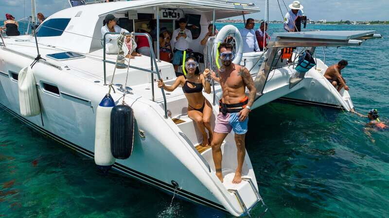 Cancún Catamaran to Isla Mujeres + Snorkel, Open Bar & Lunch - Key Points