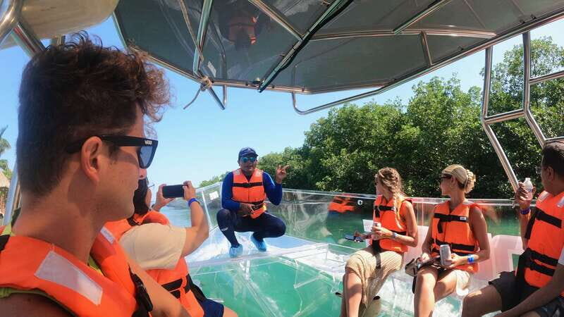 Cancún: Clear Boat Ride with drinks - Key Points