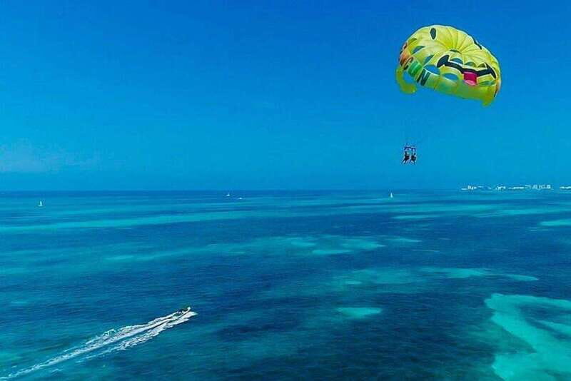 Cancun Combo Tour: 4-Reef Stop Snorkeling and Parasail Ride - The Experience in Detail
