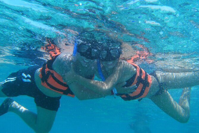 Catamaran family friendly Tour to Isla Mujeres with lunch - Authentic Experiences and Tips from Reviews