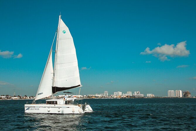 Catamaran Platinum to Isla Mujeres, Snorkel, Buffet and Open Bar - Key Points