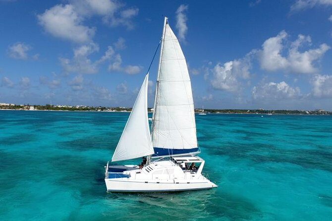 Catamaran Sailing Experience & Snorkeling Tour to Isla Mujeres - Key Points
