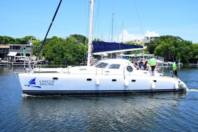 Catamaran Tour to Isla Mujeres, Open bar, Lunch, Snorkeling, Beach Club Included - FAQs