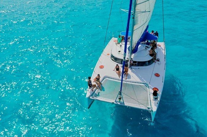 Catamaran Tour to Isla Mujeres Snorkeling with Buffet and Open Bar - The Experience of Snorkeling and Beach Time