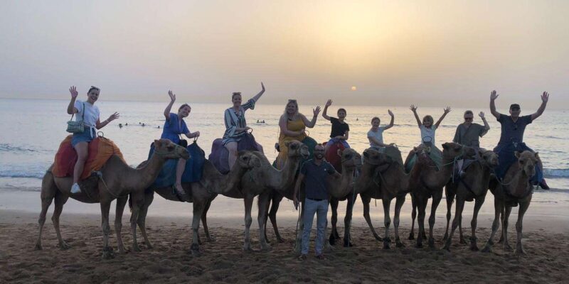 Caves, sunset, camel ride with beach view & barbecue dinner - Key Points