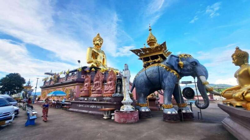 Chiang Mai: Chiang Rai Golden Triangle and Laos Boat Trip - The White Temple (Wat Rong Khun): A Surreal Masterpiece