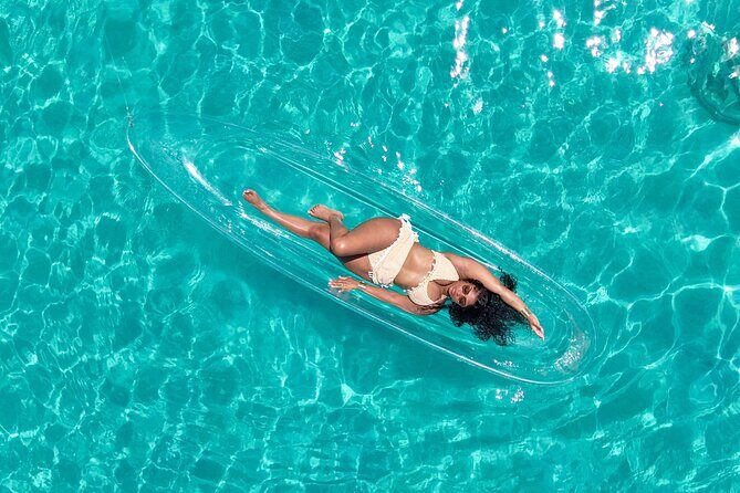 Clear kayak photoshoot Nassau Bahamas. - Key Points