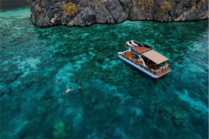 Coron Island Hopping: Private Double Deck Party Boat Slide - Exploring Coron on the Double-Decker Party Boat