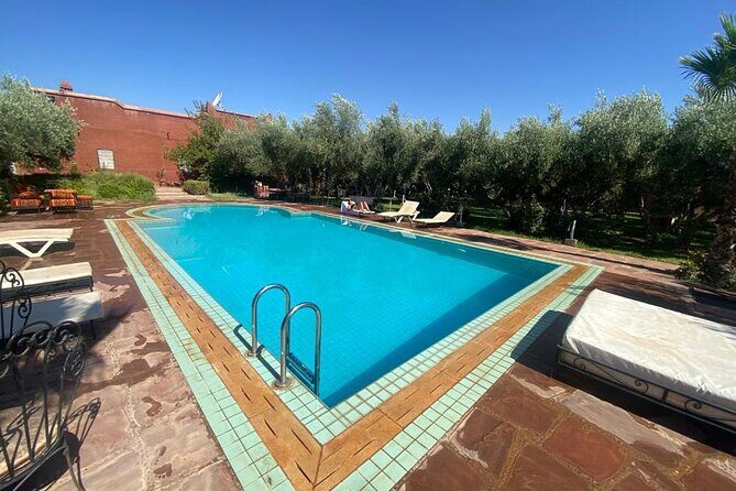 Day pool lunch and camel around Marrakech - The Sum Up