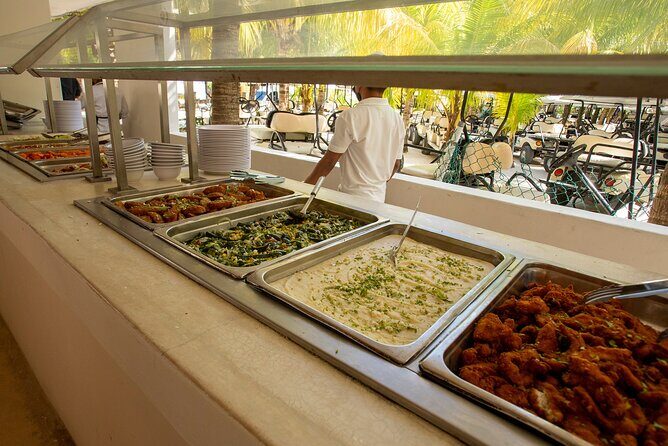 Deluxe Catamaran tour to Isla Mujeres with Open Bar and Lunch - What Travelers Love and What to Consider