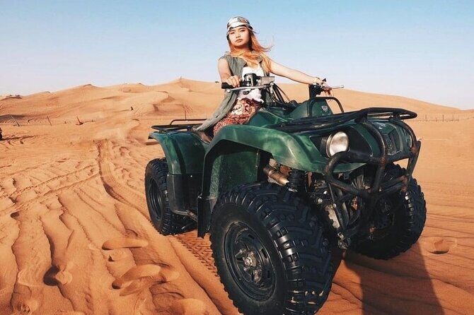 Desert Safari Dubai 25 minutes Quad Bike Free Camel Ride BBQ Dinner - Key Points