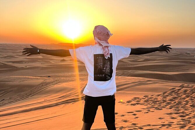 Desert safari Dubai with BBQ Dinner - Sandboarding: Sliding from the Dunes