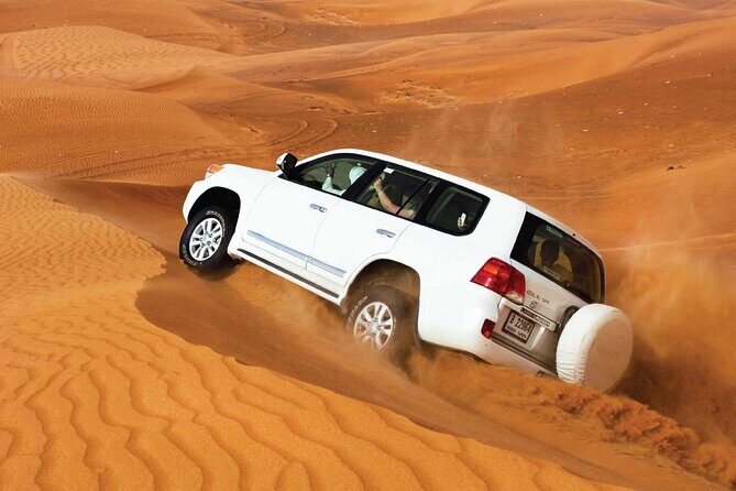 Desert Safari Redsand Dunes with BBQ Dinner in Dubai - Starting in the City, Heading into the Dunes