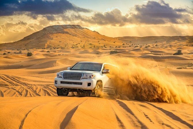 Desert Safari with BBQ Dinner -Pick Up From Dubai Hotels - Key Points