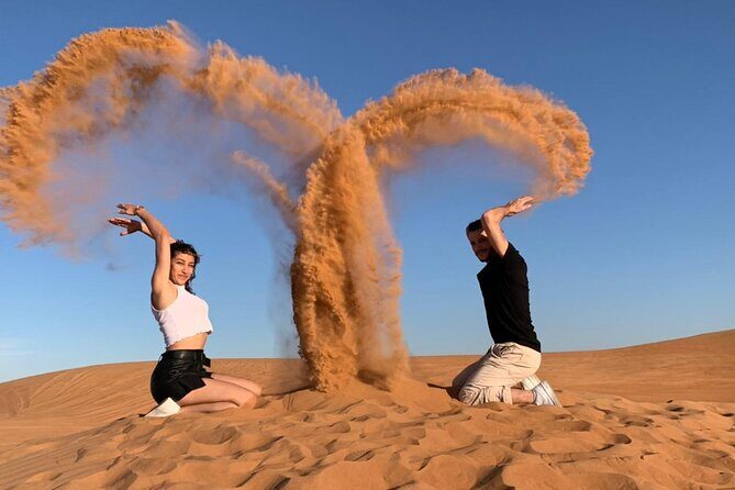 Desert Safari with Camel Ride, BBQ Dinner, Sand Board & Live Show - Key Points