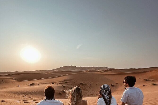 Desert Safari with Quad Bike Camel ride ,SandBoarding ,InalndSea - First Stop: The Desert Gateway