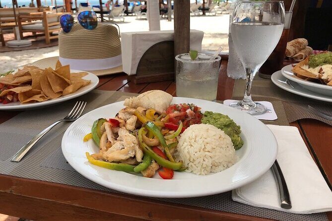 Discover Isla Mujeres in Catamaran. Buffet, Open Bar and Snorkel - Who Should Consider This Tour?