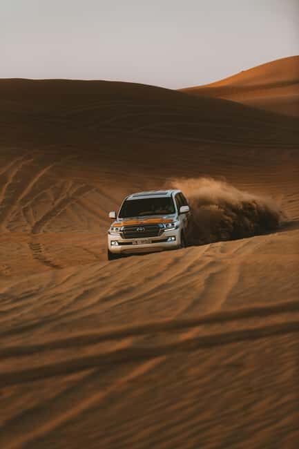 Doha City Tour with Desert Safari and Inland Sea Visit - Authenticity and Insights from Reviews