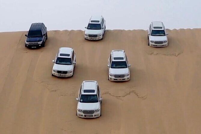 Doha Sharing Desert Safari with Dune Bashing and Sand Boarding - Key Points