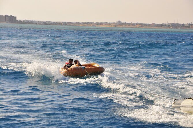 Dolphin House Cruise with water sports and Lunch in Hurghada - Diving Into the Details: Itinerary Breakdown
