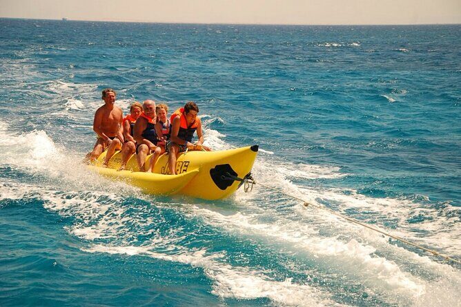 Dolphin tour & banana boat fun with snorkeling from Hurghada - The Sum Up