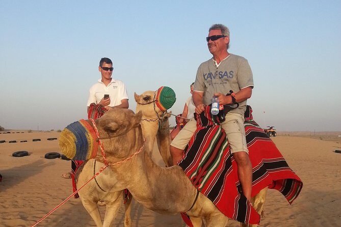 Dubai Desert Morning Tour in 4WD Vehicle: Camel Ride, Quad Bike Tour, Sandboarding, and Camel Farm - An Introduction to the Tour