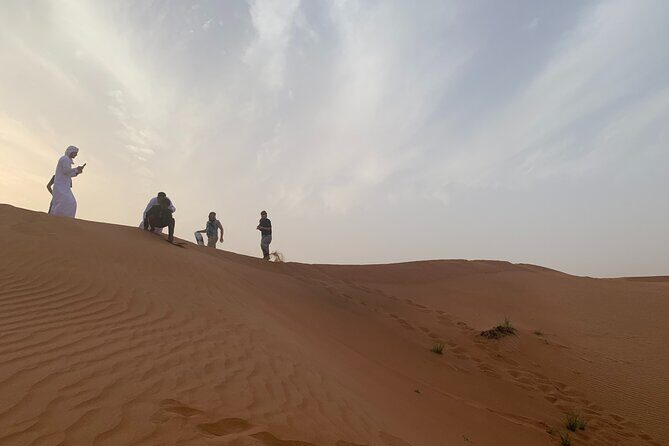 Dubai Desert Safari-BBQ Dinner, Belly Dance, Fire show - The Journey Begins: From Dubai to the Dunes