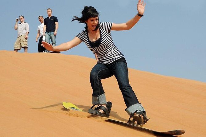 Dubai Desert Safari with BBQ Dinner, Camel Ride, and Shows - Key Points